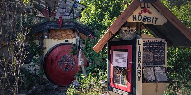 Hobbit house and its little free library