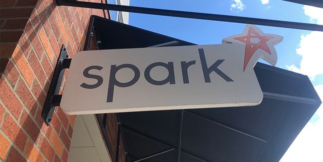Spark Central wooden sign