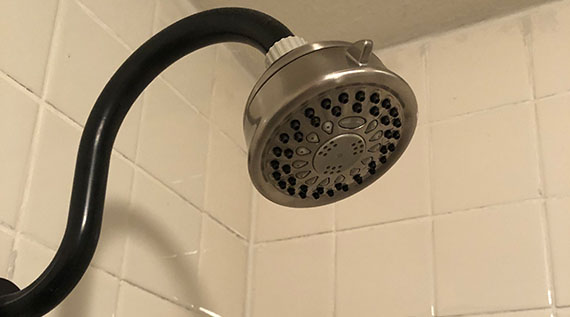 Low-flow showerhead installed in a shower