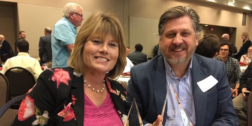 Man and woman smiling