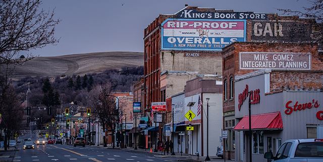 View of a street in Colfax, Washington with businesses along the sides