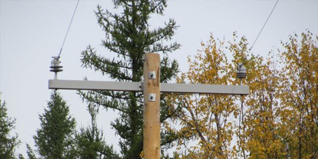 Power pole showing fiberglass cross arms