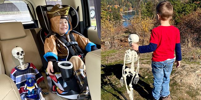 Two photos - the left photo is a little boy in a pirate costume in his car seat sitting next to a plastic skeleton wearing a long shirt. The right photo is the back view of the same little boy on a hike, looking over the river, and holding the same plastic skeleton