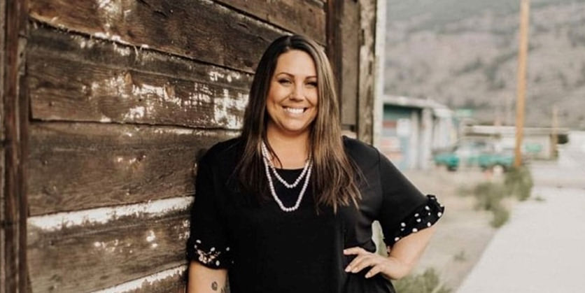 Okanogan County resident Justine, posting outside and smiling