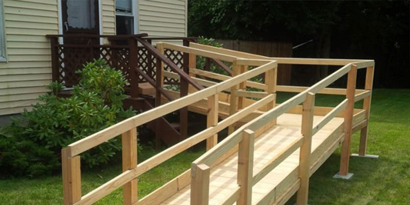 Wooden ramp leading up to a home's front door