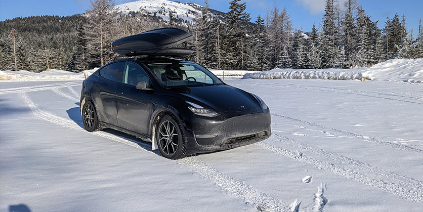 Electric vehicle parked in the snow
