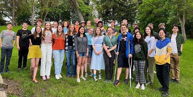 Group of students smiling outdoors