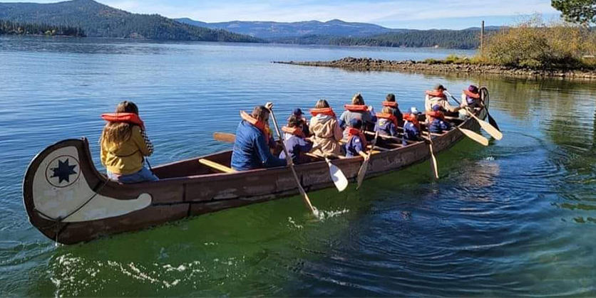 Group of Boy Scout children in a canoe