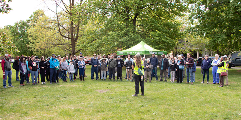 Group of volunteers outside at a Lands Council tree planting event