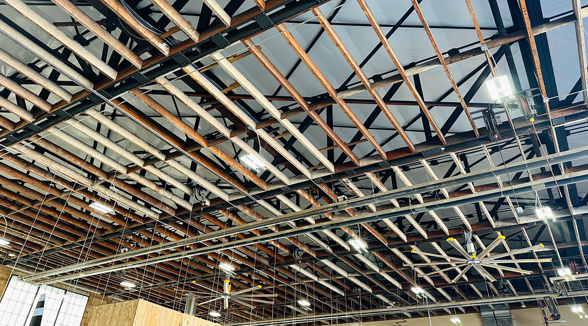 LED lights on the ceiling of an airplane hangar.