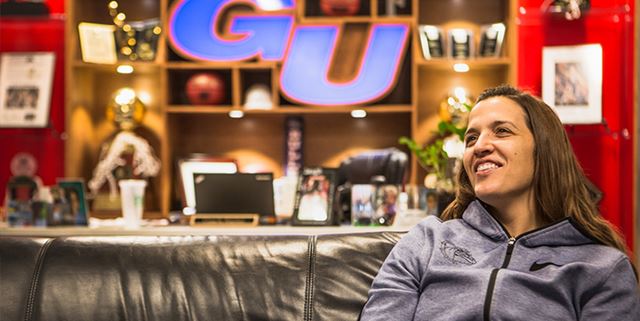 Woman smiling on couch