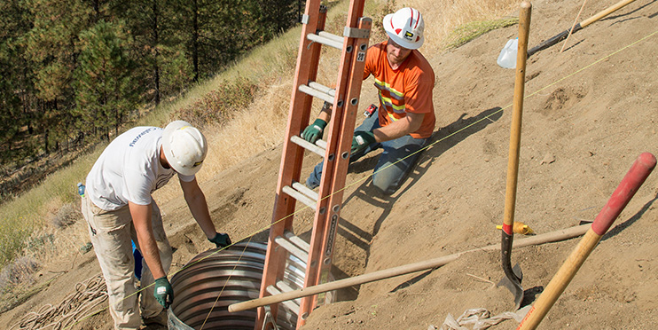 Men working on hill