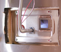Gas flame seen inside equipment