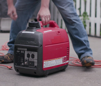 Man starting gas generator
