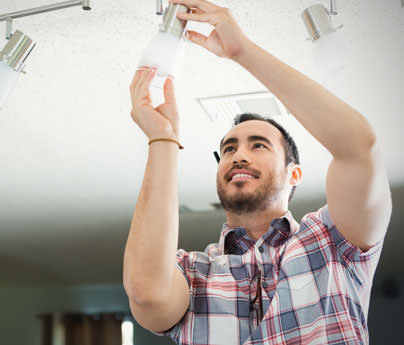 Man changing a lightbulb